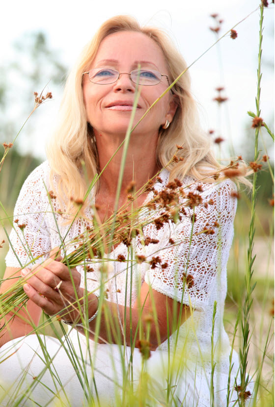 woman in tall grass